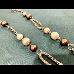 Pearl and chunky silver chain necklace.